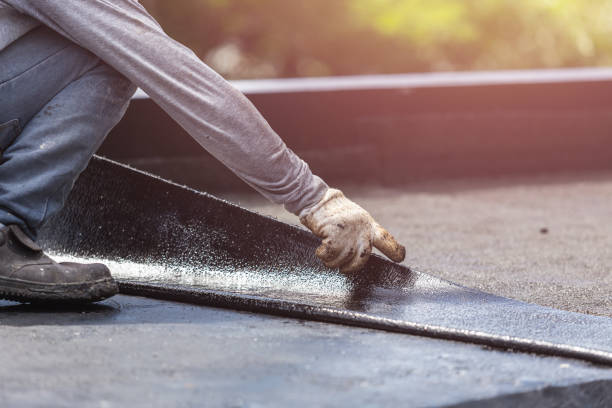 Professional Waterproofing technician working in Royal Center, IN